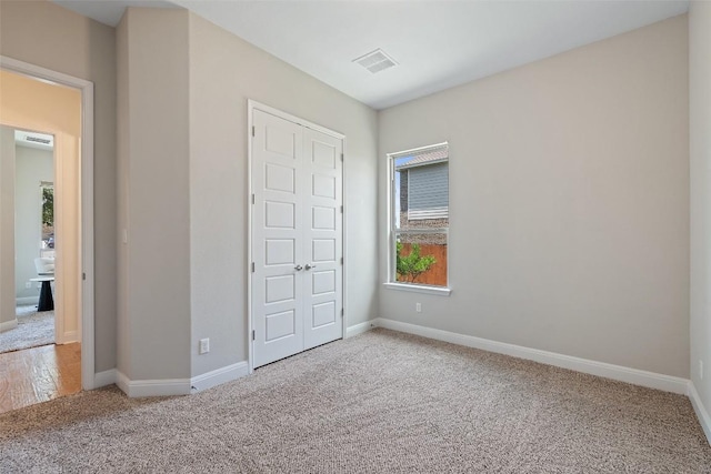 20213 Hidden Gully Ln, Pflugerville, TX 78660 - unfurnished bedroom with carpet flooring, baseboards, and a closet
