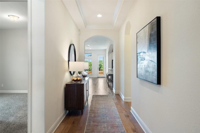 20213 Hidden Gully Ln, Pflugerville, TX 78660 - hallway featuring arched walkways, wood finished floors, ornamental molding, baseboards, and recessed lighting