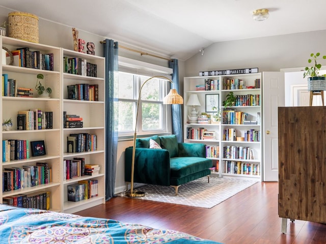 12705 Bransford Cv, Austin, TX 78753 - sitting room with lofted ceiling and wood finished floors