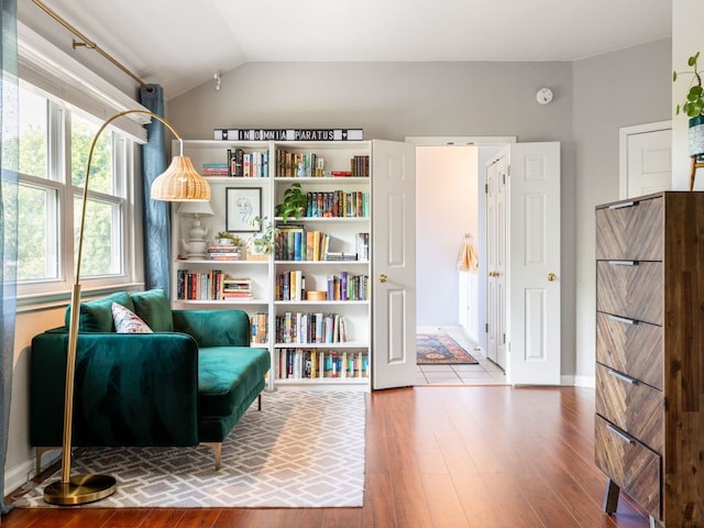 12705 Bransford Cv, Austin, TX 78753 - sitting room featuring hardwood / wood-style floors and vaulted ceiling