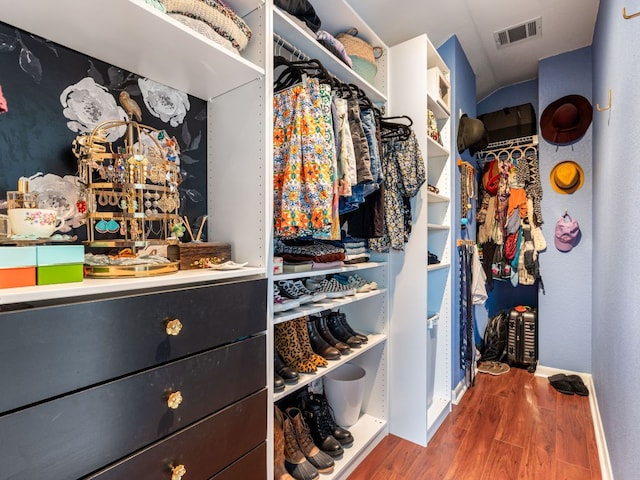 12705 Bransford Cv, Austin, TX 78753 - spacious closet featuring wood finished floors