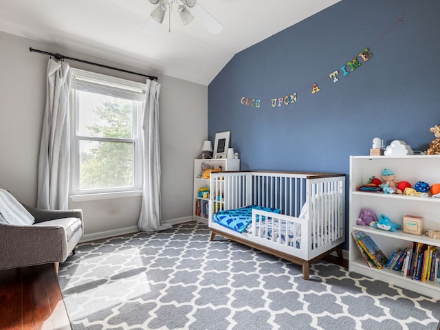 12705 Bransford Cv, Austin, TX 78753 - bedroom with vaulted ceiling, a nursery area, ceiling fan, and baseboards
