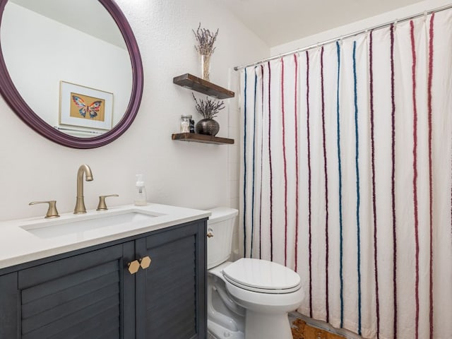 12705 Bransford Cv, Austin, TX 78753 - bathroom featuring toilet and vanity