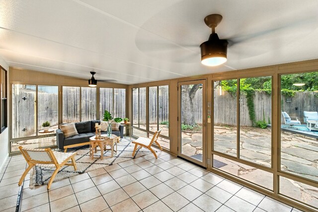 12707 Palfrey Dr, Austin, TX 78727 - sunroom with tile patterned flooring and lofted ceiling