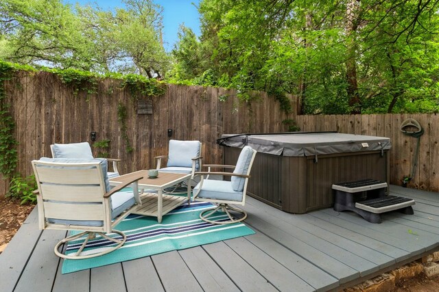 12707 Palfrey Dr, Austin, TX 78727 - wooden terrace with a hot tub and a fenced backyard