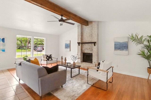 12707 Palfrey Dr, Austin, TX 78727 - living area featuring ceiling fan, baseboards, a fireplace, and wood finished floors
