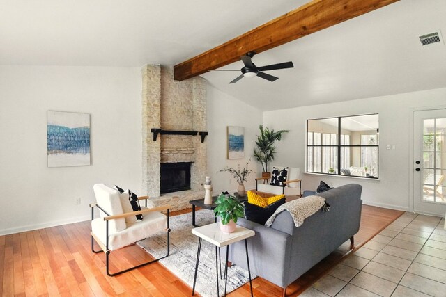 12707 Palfrey Dr, Austin, TX 78727 - living area with a ceiling fan, baseboards, a fireplace, and wood finished floors