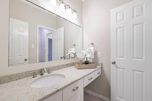 10113 Cassandra Dr, Austin, TX 78717 - bathroom featuring vanity and tile patterned floors