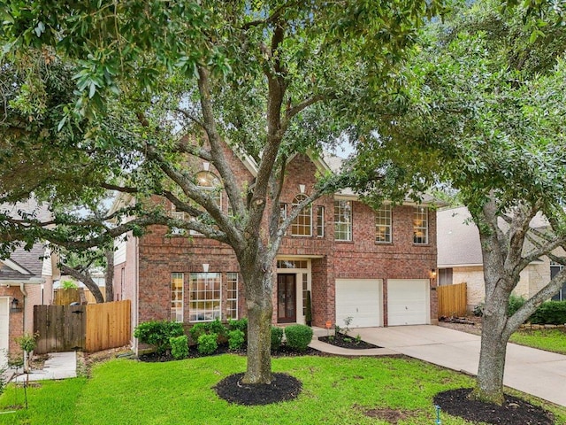 10113 Cassandra Dr, Austin, TX 78717 - view of front of house with driveway, brick siding, and an attached garage