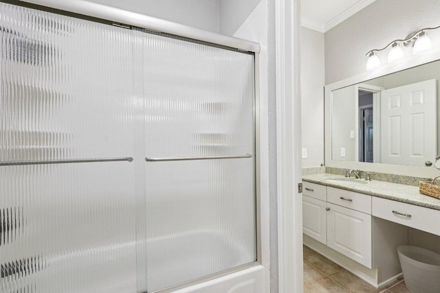 10113 Cassandra Dr, Austin, TX 78717 - full bathroom with ornamental molding, vanity, and tile patterned floors
