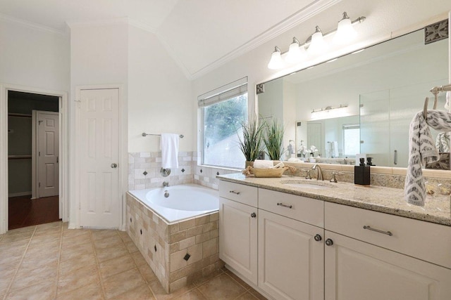 10113 Cassandra Dr, Austin, TX 78717 - bathroom with vanity, a bath, crown molding, tile patterned floors, and vaulted ceiling