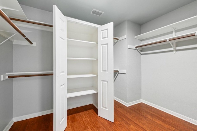 10113 Cassandra Dr, Austin, TX 78717 - spacious closet featuring wood finished floors