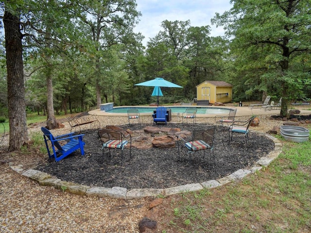 247 Campfire Way, Smithville, TX 78957 - swimming pool featuring view of wooded area