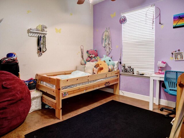 247 Campfire Way, Smithville, TX 78957 - bedroom with ceiling fan and baseboards
