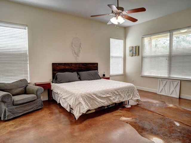 247 Campfire Way, Smithville, TX 78957 - bedroom featuring baseboards and ceiling fan