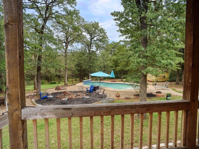 247 Campfire Way, Smithville, TX 78957 - view of green lawn with an outdoor pool