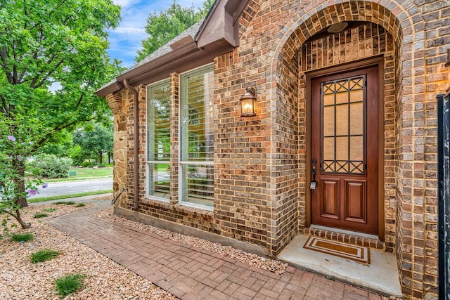 1055 Sunflower Trl, Austin, TX 78745 - doorway to property featuring brick siding