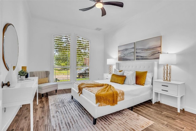 1055 Sunflower Trl, Austin, TX 78745 - bedroom with wood finished floors and a ceiling fan