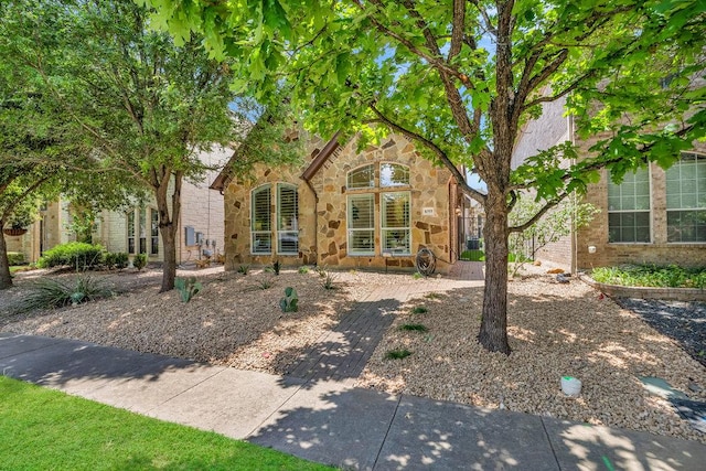 1055 Sunflower Trl, Austin, TX 78745 - view of front of home featuring stone siding