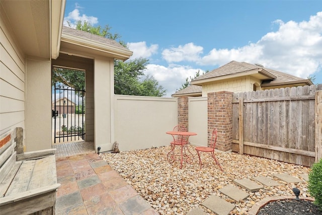 238 Rock Bluff Ln, San Marcos, TX 78666 - view of patio featuring a gate