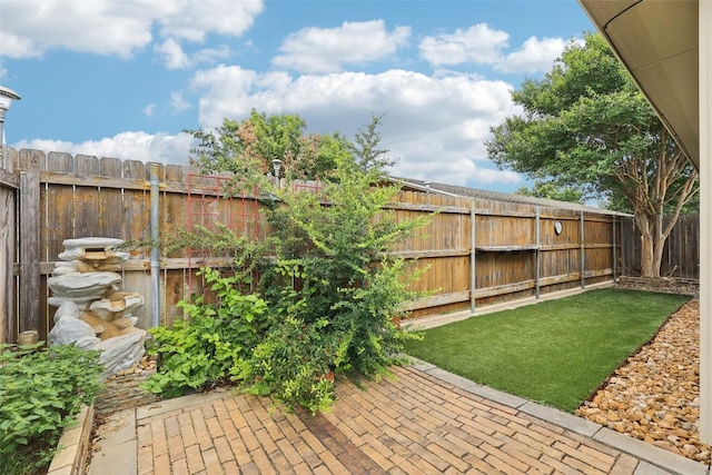 238 Rock Bluff Ln, San Marcos, TX 78666 - fenced backyard with a patio