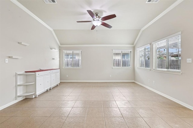 238 Rock Bluff Ln, San Marcos, TX 78666 - spare room featuring vaulted ceiling, healthy amount of natural light, light tile patterned floors, ceiling fan, and ornamental molding