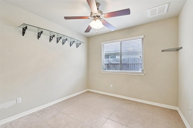 238 Rock Bluff Ln, San Marcos, TX 78666 - spare room with light tile patterned floors and ceiling fan
