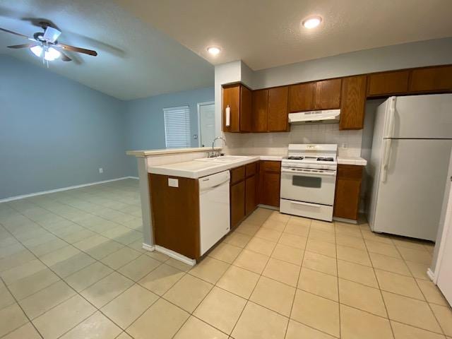 1402 Waterloo Trl, Austin, TX 78704 - kitchen featuring white appliances, a sink, under cabinet range hood, ceiling fan, and light countertops