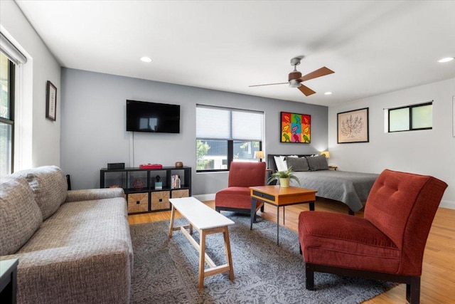 1706 Canterbury St, Austin, TX 78702 - living room with ceiling fan, recessed lighting, wood finished floors, and baseboards