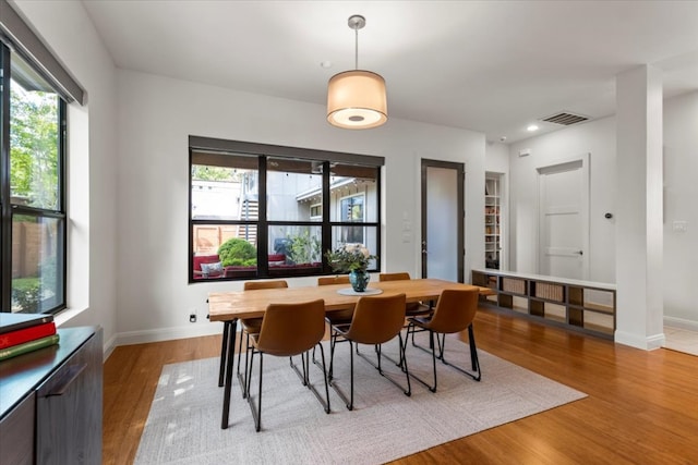1706 Canterbury St, Austin, TX 78702 - dining space featuring plenty of natural light, light wood finished floors, baseboards, and recessed lighting