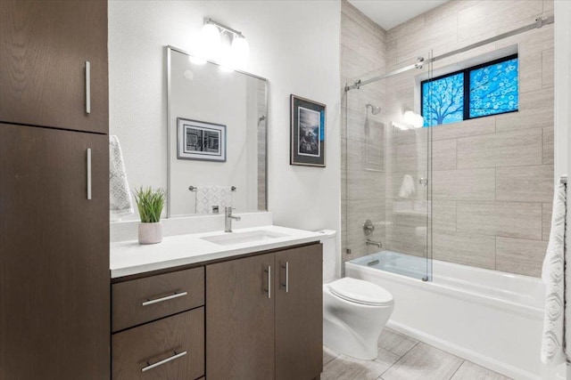 1706 Canterbury St, Austin, TX 78702 - bathroom featuring toilet, vanity, and enclosed tub / shower combo