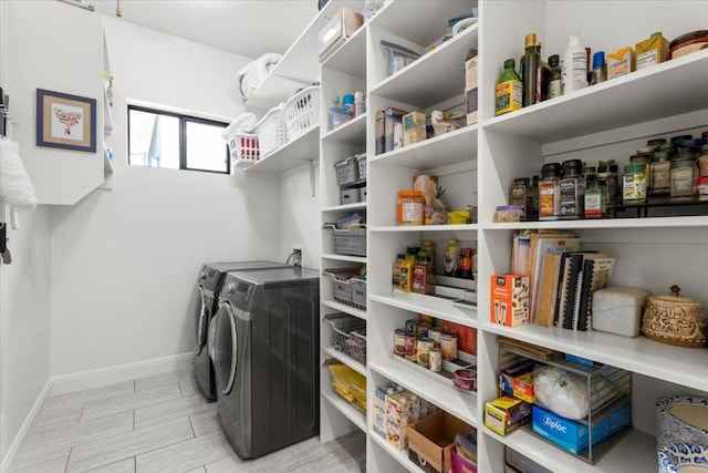 1706 Canterbury St, Austin, TX 78702 - washroom with baseboards and washing machine and dryer