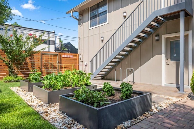 1706 Canterbury St, Austin, TX 78702 - view of exterior entry featuring board and batten siding