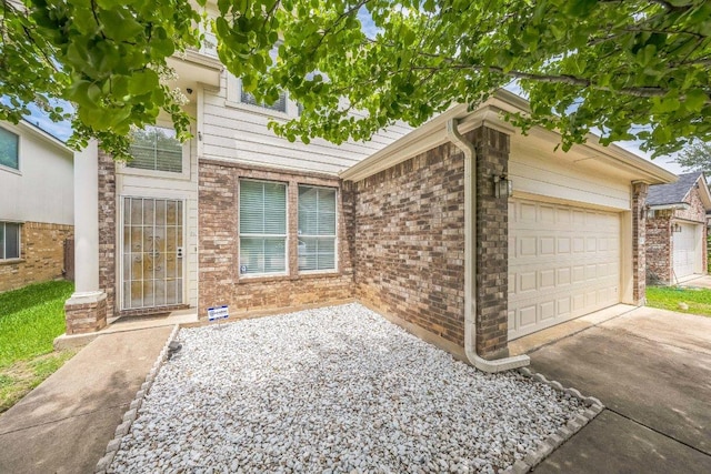 633 Sweet Leaf Ln, Pflugerville, TX 78660 - view of front of home featuring an attached garage and driveway