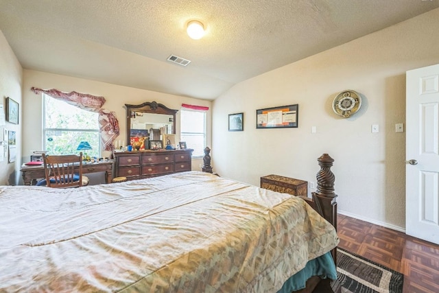 633 Sweet Leaf Ln, Pflugerville, TX 78660 - bedroom with vaulted ceiling, multiple windows, a textured ceiling, and baseboards