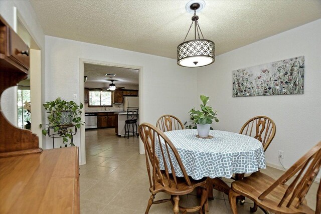 304 White Wing Way, Round Rock, TX 78664 - dining area with a textured ceiling and a ceiling fan