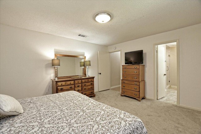 304 White Wing Way, Round Rock, TX 78664 - bedroom with carpet, a textured ceiling, and baseboards