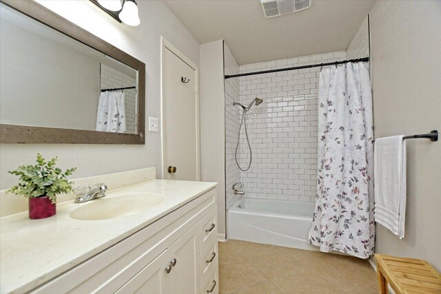 304 White Wing Way, Round Rock, TX 78664 - full bath with vanity, tile patterned floors, and shower / bathtub combination with curtain