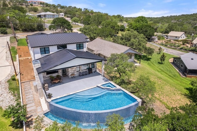 335 Sandy Mountain Dr, Sunrise Beach, TX 78643 - view of pool featuring a patio area and a pool with connected hot tub