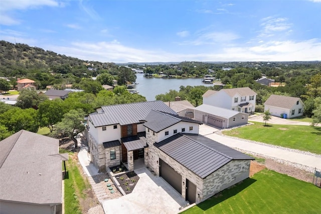 335 Sandy Mountain Dr, Sunrise Beach, TX 78643 - aerial view of residential area featuring a large body of water