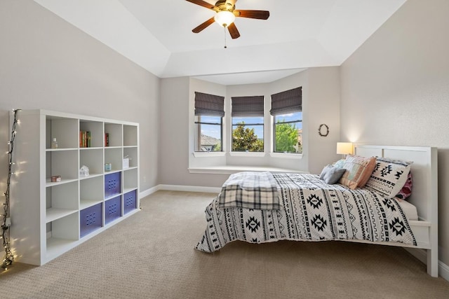 1501 University Club Dr, Austin, TX 78732 - carpeted bedroom with baseboards, ceiling fan, and a tray ceiling
