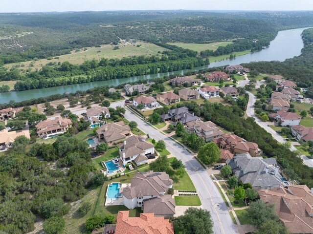 1501 University Club Dr, Austin, TX 78732 - aerial view of property's location with a nearby body of water, nearby suburban area, and a heavily wooded area