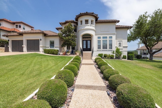 1501 University Club Dr, Austin, TX 78732 - mediterranean / spanish-style home featuring french doors, a garage, a front yard, stucco siding, and a tile roof