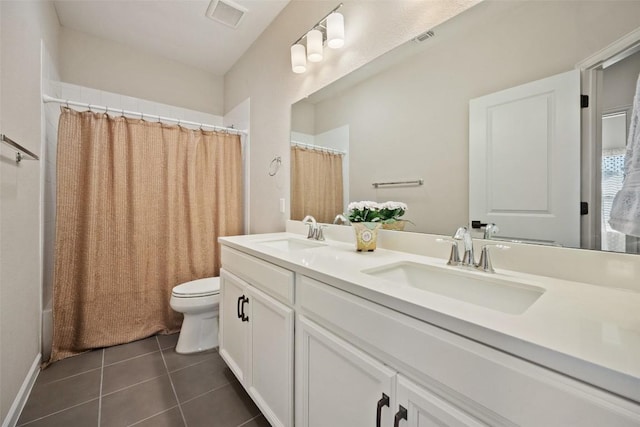 5820 Harper Park Dr Unit 66, Austin, TX 78735 - bathroom featuring toilet, double vanity, tile patterned flooring, and shower / tub combo
