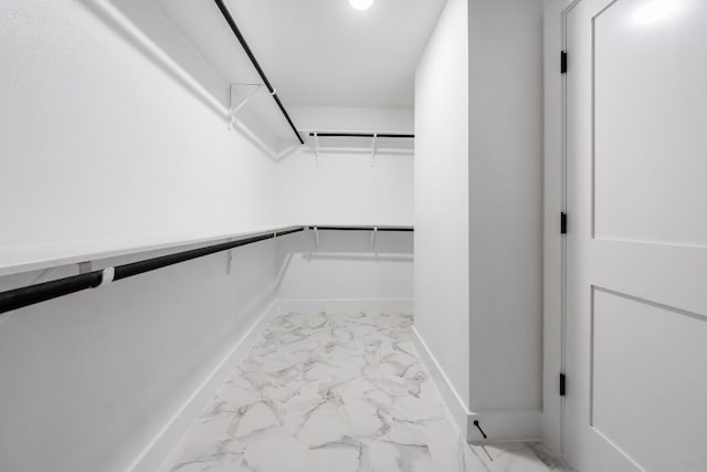 13322 Villa Park Dr, Austin, TX 78729 - spacious closet with light marble finish flooring