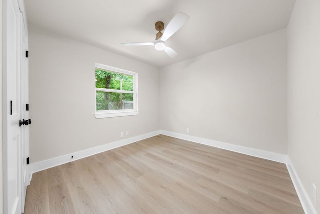 13322 Villa Park Dr, Austin, TX 78729 - empty room featuring light wood-style floors, ceiling fan, and baseboards
