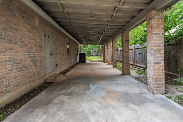 13322 Villa Park Dr, Austin, TX 78729 - view of patio / terrace featuring an attached carport and cooling unit
