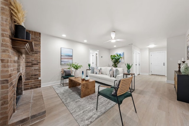 13322 Villa Park Dr, Austin, TX 78729 - living area featuring light wood finished floors, baseboards, a ceiling fan, and recessed lighting
