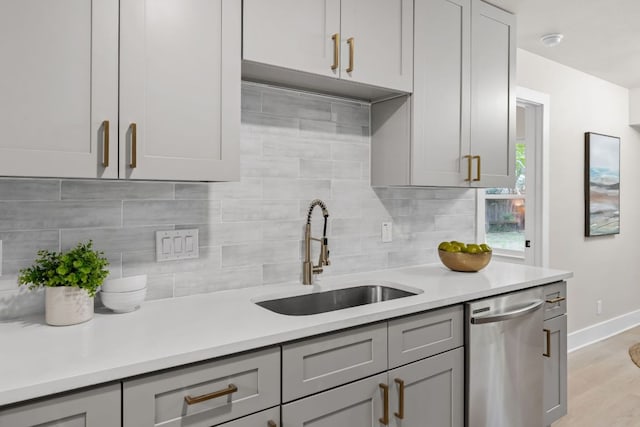 13322 Villa Park Dr, Austin, TX 78729 - kitchen with dishwasher, a sink, tasteful backsplash, and light countertops