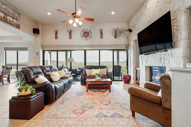 17400 Northlake Hills Dr, Jonestown, TX 78645 - living area featuring ceiling fan, a high ceiling, a multi sided fireplace, and recessed lighting